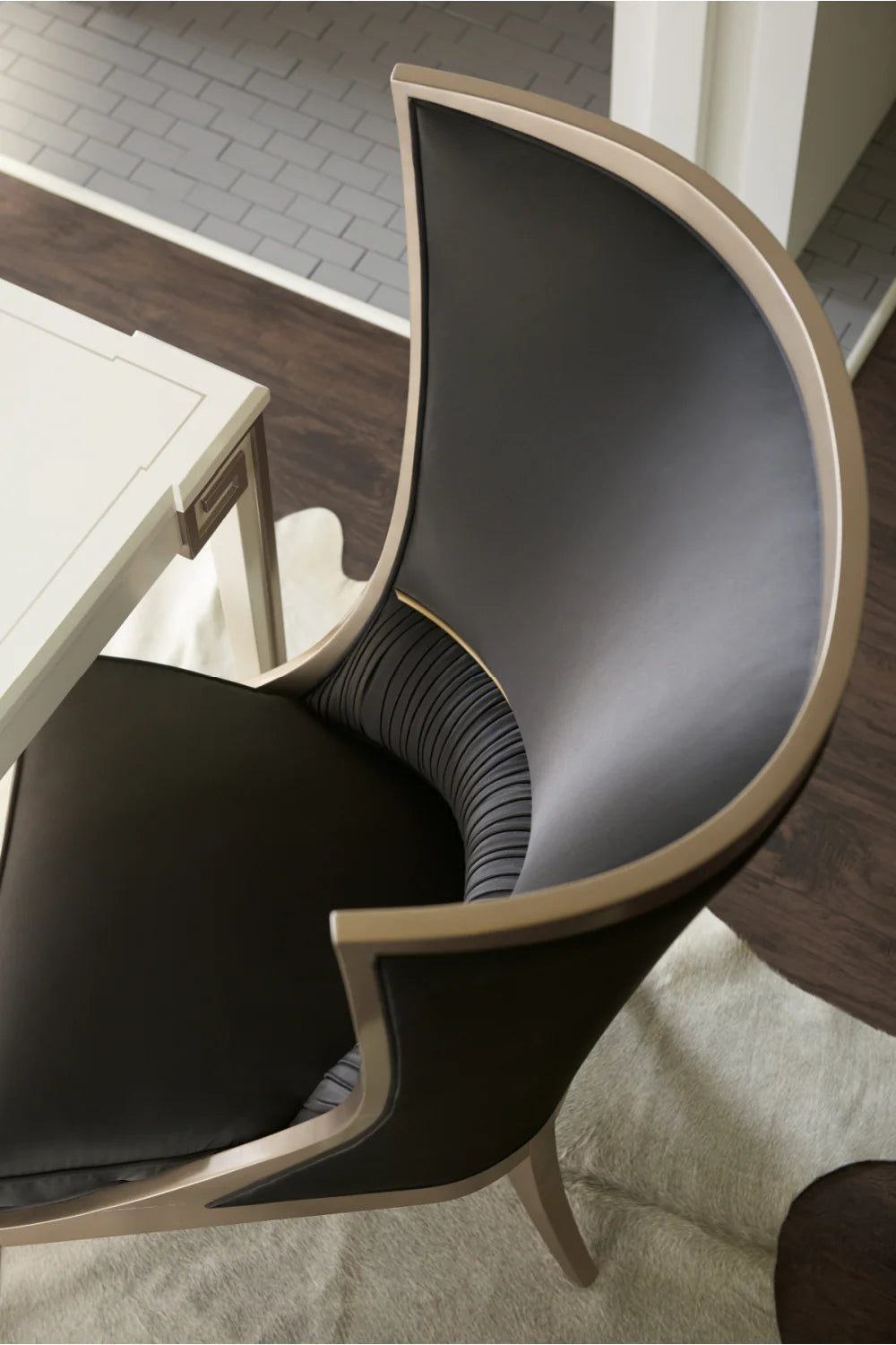 Black Curved Wingback Chair